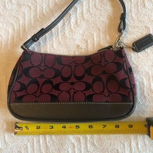 Like new Coach purse in burgundy and black